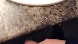 Young guy masterbates in bathroom